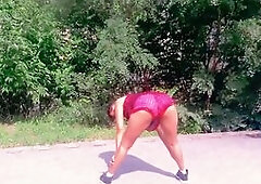 MOTORCYLE FEMALE Teasing In Public Doing Yoga Stretching And Greater quantity Park
