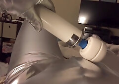 Wearing Latex And Spandex Layers Masturbating Until Cumshot