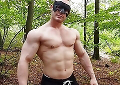 Masked muscled stud solo masturbates outdoor and cums