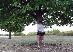 tgirl posed in public with thrashing spunk fountain in nylon nylons and miniskirt