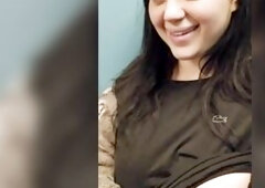 Flashing my breasts in the public elevator