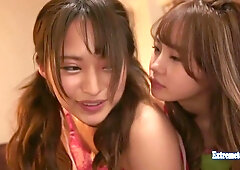 Two Japanese women dominate a man with passionate kissing and cowgirl riding