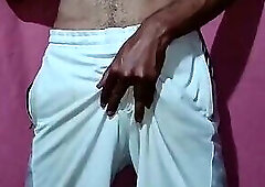 Sexy guy in pants gets naked and masturbates until he has a massive cumshot