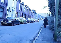 crossdresser outdoors on a residential street