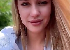 Blonde Babe Flirts in City Park
