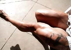 Muscled golden-haired is showing her astounding body in front of the camera, just for pleasure