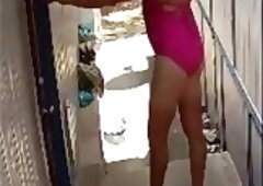 Tina Posing in Pink One-piece Swimsuit