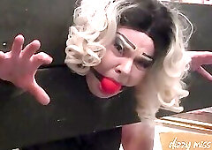 Dizzy Miss Sizzy is gagged and put in the stocks