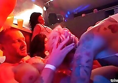 Super sexy girls are having a lot of fun in the night club, with random guys