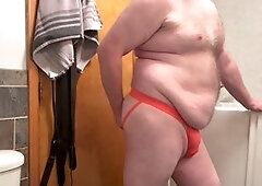 Huge furry bear Toddtricks squirts through jockstrap while using dildos