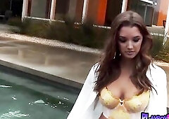 Smokin' sexy large titted brunette hair sweetheart posing stripped in the pool