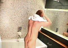 Sexy guy showering alone