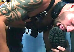 Dominant leather stud whipping his deepthroating sub