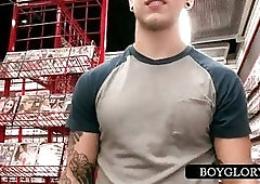 Gay stud sucks penis on gloryhole