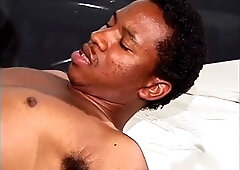 Chocolate skinned studs have a sensual fuck on a massage bed