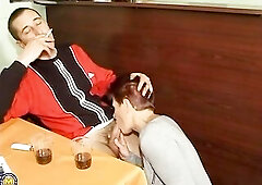 Vintage stud smokes a cigarette and gets a oral-sex from curly