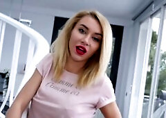 Inked blonde Katrin Tequila pleasuring a dick with her thick, red lips