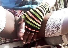 Ebony Tgirl in the Forest flashing her t-girl penis outdoors