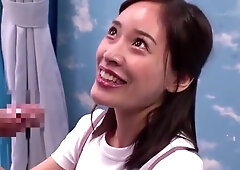 She touches the penis in front of her and takes it deep into her throat while giving it a blowjob.