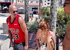 Redheaded beauty joins two ebony men for a steamy threesome in the city