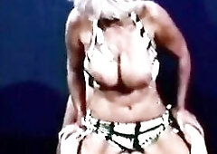 Glamorous golden-haired sailor sweetheart Candy Samples disrobes off her top