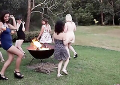 It’s cocktail hour at the No Regrets Retreat. As the sun sets, the fire is a-blaze, the cuties sip and mingle like wicked pixies set free from their