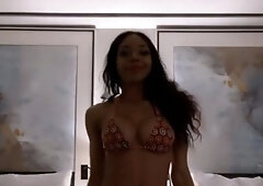 Busty curly brunette with big boobs fucks on couch