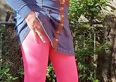 Crossdresser enjoys solo outdoor fun, masturbates in pantyhose and mini-skirt, finishing with a cumshot