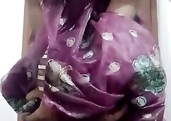 Indian Gay Crossdresser Bottom Gaurisissy showing her big boobs in purple saree