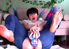 Filling it all up in fake cum, the short-haired dyke is getting it all