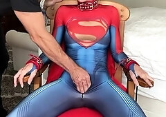 Supergirl subjected to hardcore deepthroating session