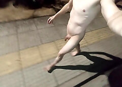 Ambling fully nude on the street