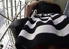 Attractive amateur blonde with a sublime ass upskirt outside