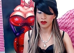 Tranny with red lips stroking her cock