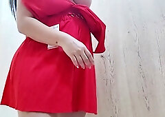 Voluptuous Latina mother-in-law changes clothes on camera in a private studio