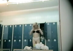 Mature changing and showing the naked big belly