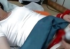 Shemale in black stockings is tied up while toyed with