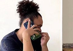 Tranny speaking from her smartphone