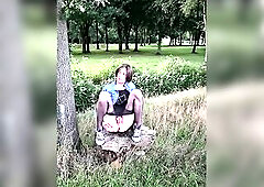 Clothed in denim jacket, nylons, petticoat and converse sneakers. A walk in park showong what I've beneath my petticoat