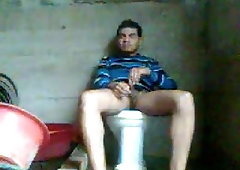 Dirty guy masturbates on a toilet sink