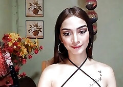 Shemale teasing you with her 9 inch dildo