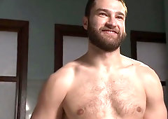 Blindfolded wrestler gets his cock tugged