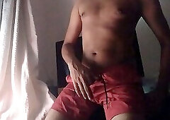 Muscle sexy twink rubs himself wet