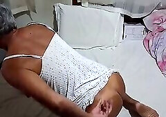 Ladysilva on the bed in a dress without panties showing off her hot ass