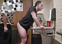 Sucking off a well-endowed boy in the mall bathroom!