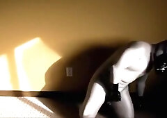 Silver Latex Catsuit and Gas Mask