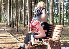 Blonde bombshell bravely rides stranger's hard cock in public park despite almost getting caught!