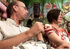 Giant group sex action on brunette hair honey on the sofa.