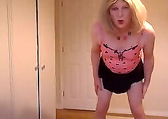 Black miniskirt and nude pantyhose