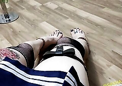 POV movie scene. (POV). A youthful femboy admires her glamorous legs with a recent red peducure and rings on her toes, clothed in a short petticoat, a